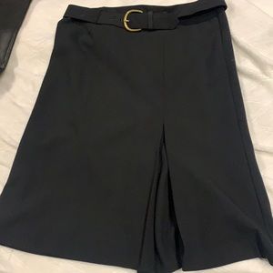Trina Turk size 10 belted black knee length skirt with front pleat
